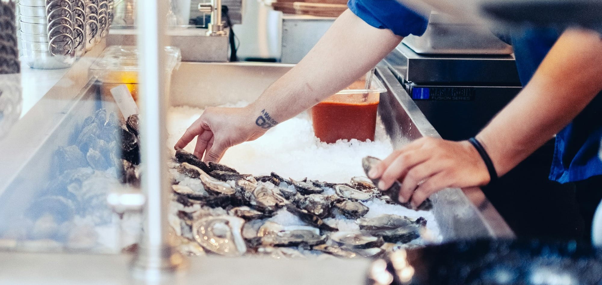 a person making oysters