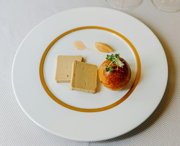 Slices of Foie Gras serve on the white plate